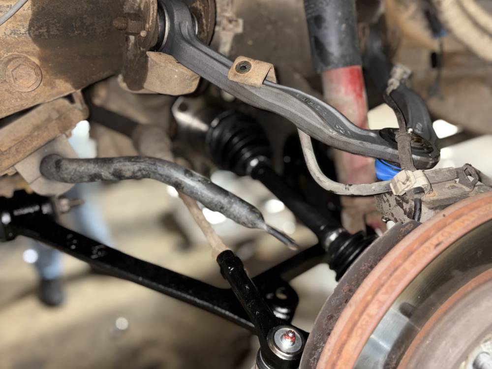 Rotor and axle detail during a brake repair inspection in North Little Rock, Arkansas