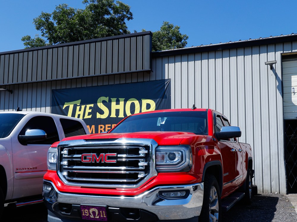 Customer GMC Sierra finished and ready for pickup outside The Shop, GM Repair in North Little Rock, Arkansas