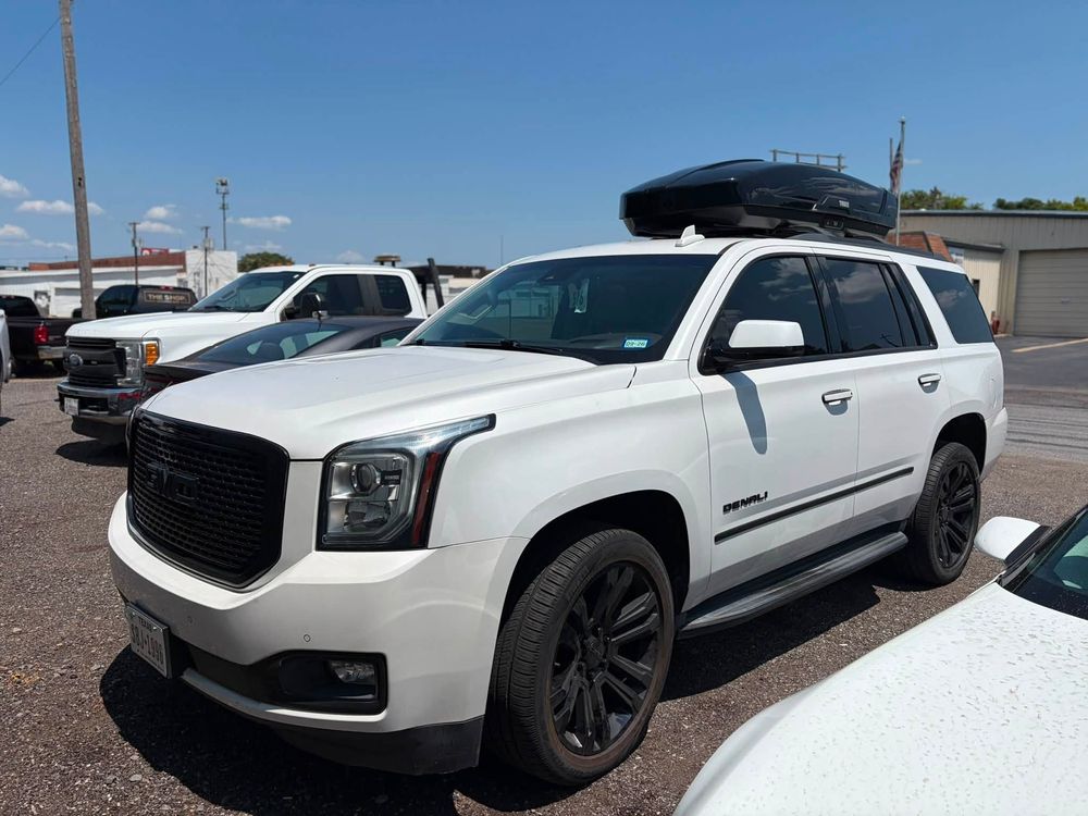 White GMC Yukon Denali in for AC condenser replacement in North Little Rock, Arkansas